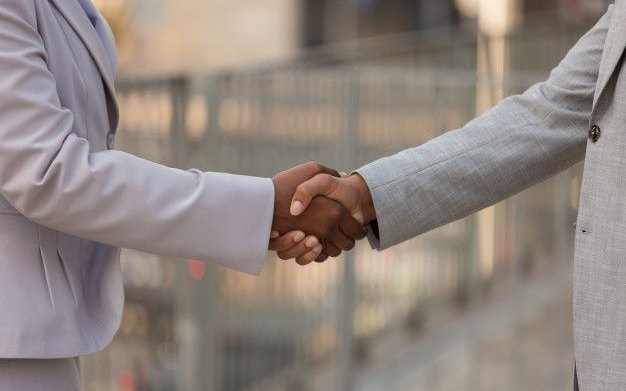 A handshake in a public place